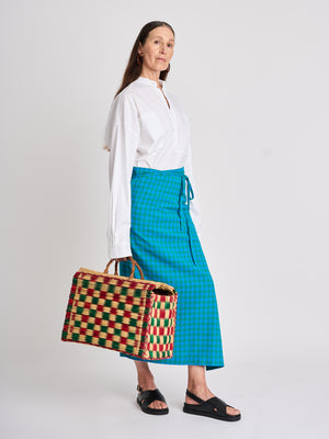 The Lucie Marquis ‘Rae Midi’, a timeless midi-length wrap skirt. An essential holiday item - this versatile piece, effortlessly transitions from day to night, making it ideal for all travel adventures. Whether lounging by the pool or exploring city life, the Rae Midi adds elegance to any ensemble.