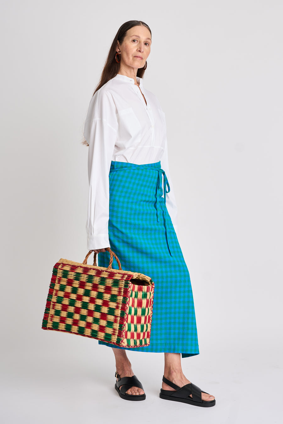 The Lucie Marquis ‘Rae Midi’, a timeless midi-length wrap skirt. An essential holiday item - this versatile piece, effortlessly transitions from day to night, making it ideal for all travel adventures. Whether lounging by the pool or exploring city life, the Rae Midi adds elegance to any ensemble.