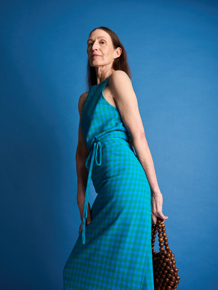 The Lucie Marquis ‘Rae Midi’, a timeless midi-length wrap skirt. An essential holiday item - this versatile piece, effortlessly transitions from day to night, making it ideal for all travel adventures. Whether lounging by the pool or exploring city life, the Rae Midi adds elegance to any ensemble.